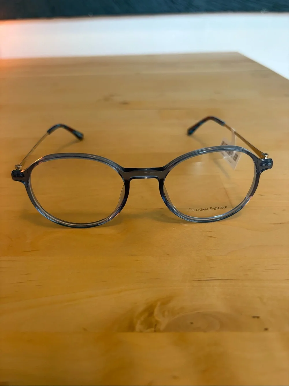 Chlogan Eyewear Round Translucent Blue Eyeglasses Silver Temples 9125 50-16-145